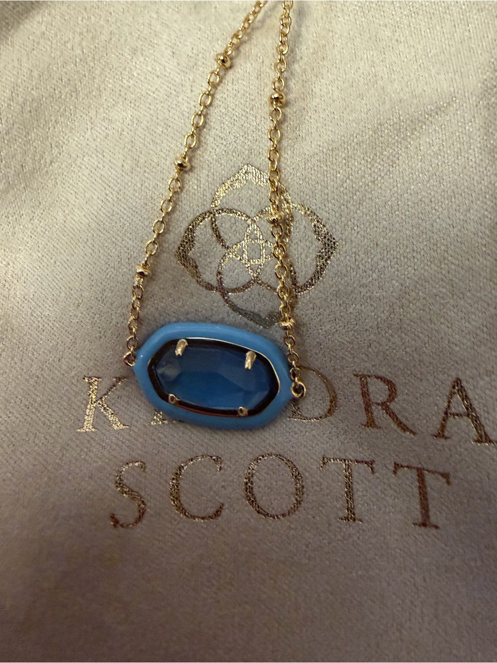 Kendra Scott Gold adjustable bracelet with carolina blue Stone